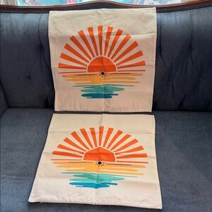New Pair of Sunset Print Pillow Covers. Featuring the Sun Setting  on the Water.
